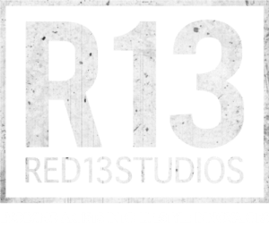 White textured Red 13 Studios logo
